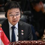 PM Singapura Lawrence Wong pulang kampung dengan pesawat kelas ekonomi dari Laos